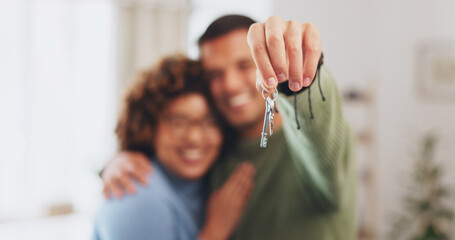 Hand, keys and a home owner couple proud of their real estate property investment or purchase. House, mortgage or beginning with a blurred background man and woman together in their new apartment - obrazy, fototapety, plakaty