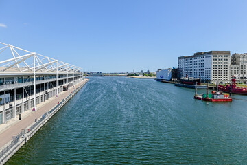 London, UK, 4 June  2023:  Aerial view of Excel Exhibition centre and Millennium Mills from bridge...