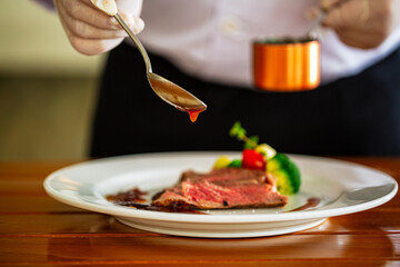 Beef steak and human hands,Be sure to have them ready in the restaurant. 