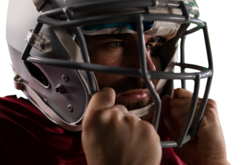 Digital png photo of portrait of hispanic rugby player in helmet on transparent background