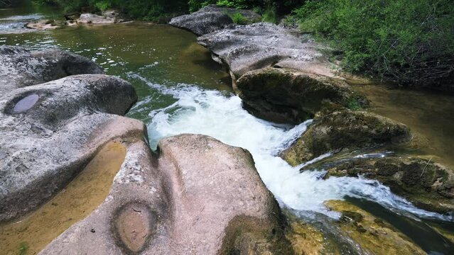 Beautiful waterfall in the natural area of the Riera de Merles
