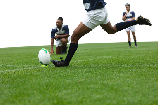 Digital png photo of diverse rugby players during game on transparent background