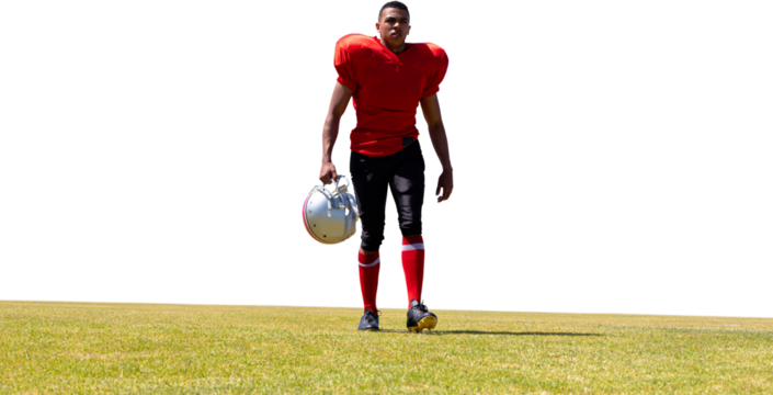 Digital png photo of african american rugby player walking on sport field on transparent background