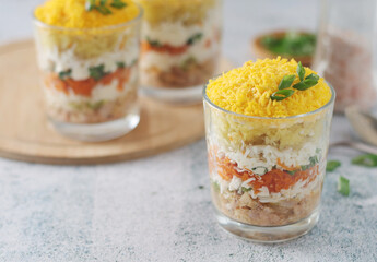 Mimosa salad in transparent glass	