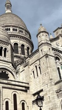 Church of the Sacre Coeur Basilica Church in Paris vertical video Paris France. High quality 4k footage