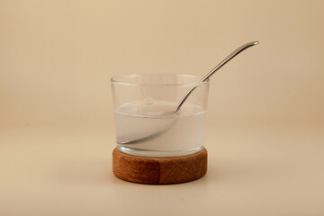 Solution of xanthan gum in glass. Xanthan gum is added to sauces, yogurts, smoothies and cosmetics...