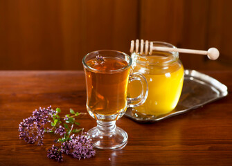 Still life from medicinal herbs, honey, herbal tea