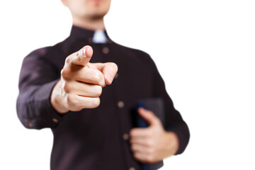 Priest pointing at camera, cut out