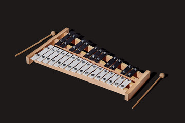 The xylophone and two mallets isolated on black background