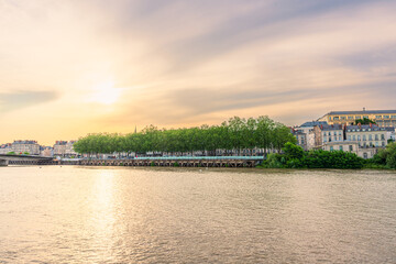 Fototapeta premium Panoramic view of the Loire River in Nantes city France at sunset