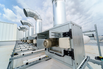 The air conditioning system of a industrial building is located on the roof