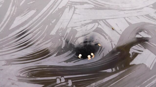 coins move on the surface and fall down