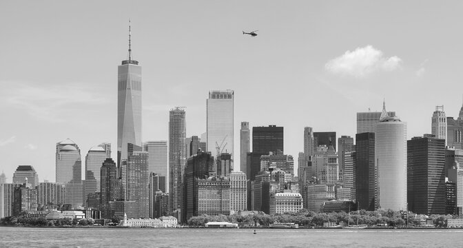 Black and white photo of New York City waterfront panorama, Manhattan, USA.