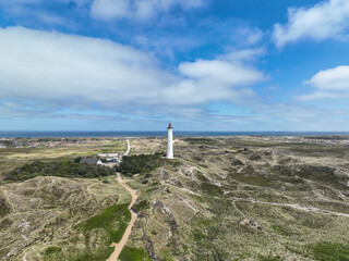 Fototapeta na wymiar Ein Leuchtturm an der Nordseeküste von Dänemark
