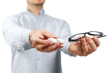 Male hands offering a choice between contact lens and eyeglasses, cut out