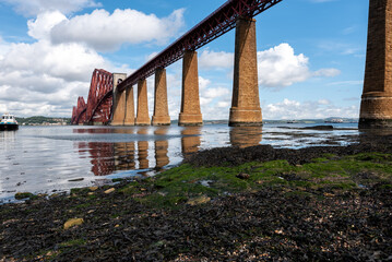 The Forth Bridge is a cantilever railway bridge over the Firth of Forth in the east of Scotland,