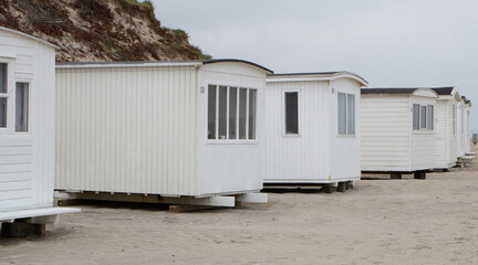Naklejka premium The beautiful beach cabins at Blokhus Beach in Denmark