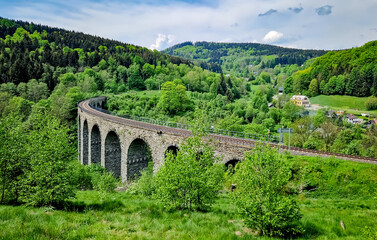 Fototapeta na wymiar View of the Novina trail viaduct in Kryštofovo Údolí, Czech Republic, Liberec region