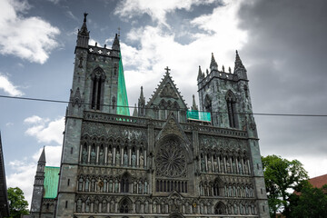 Fototapeta na wymiar Facade of the gothic Nidaros Cathedral of Trondheim, Norway