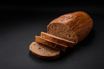 Delicious fresh crispy loaf of white bread with grains and seeds