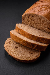 Delicious fresh crispy loaf of white bread with grains and seeds