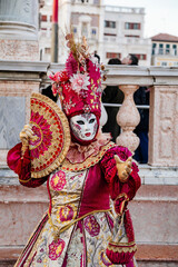 Venice, Italy, 11 February 2023: Colorful carnival masks at famous traditional festival on Saint...