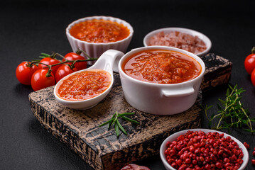 Delicious spicy tomato sauce with pepper, garlic, salt, spices and herbs
