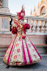 Venice, Italy, 11 February 2023: Colorful carnival masks at famous traditional festival on Saint...