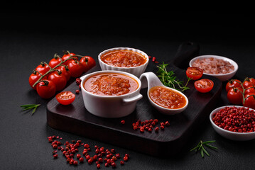 Delicious spicy tomato sauce with pepper, garlic, salt, spices and herbs