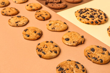 Tasty cookies on color background