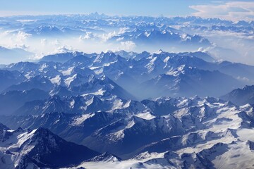 Experience the awe-inspiring beauty of the fully snow-capped Himalayas, including Mt. Everest, on an aerial flight from Delhi to Leh, Indian Ladakh.