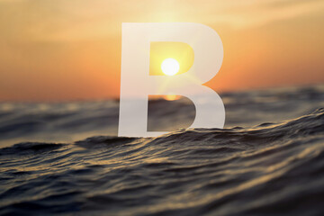 Discover a spellbinding sight as the letter "B" finds its aquatic home in the depths of the ocean. Bathed in a radiant underwater glow, this elegant symbol stands gracefully, embraced by vibrant Marin