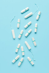 Menstrual tampons on blue background
