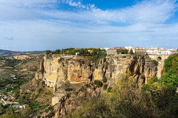Panoramic view of Puente Nuevo Bridge at sunset in Ronda, Spain on October 23, 2022
