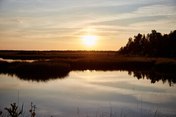 A beautiful sunset on a lake, selective focus