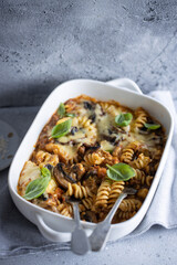 Oven baked pasta with vegetables and mushrooms
