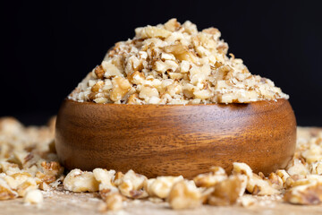 Crushed dried walnuts on the table