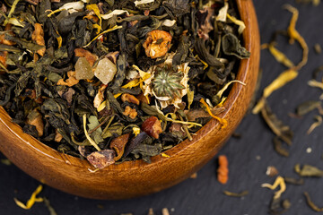 fresh green tea with pieces of fruit and berries