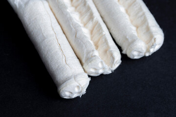 Sewn cotton wool for use as tampons