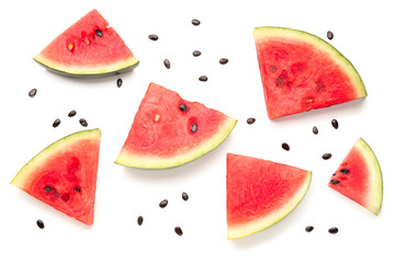 Naklejka na ściany i meble Pieces of fresh watermelon with seeds on white background