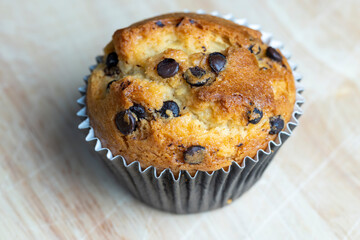 Cupcake with chocolate pieces, close up