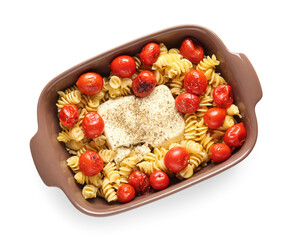 Baking dish of tasty pasta with tomatoes and feta cheese isolated on white background