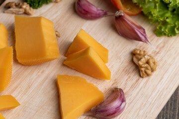 Sliced hard cheese made from milk