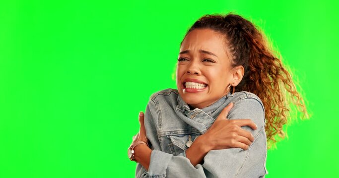 Green screen, studio and woman with jacket for cold, weather or fashion on green background. Freezing, winter and face of lady person with fashionable, trendy or clothes for cool, wind or season