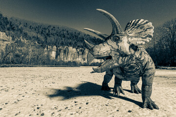 triceratops is looking back in winter times with copy space