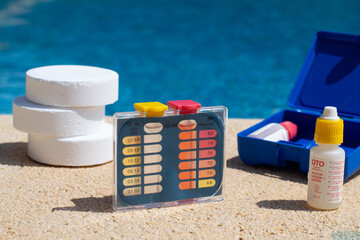 Chlorine and pH water test kit. Pool water monitoring