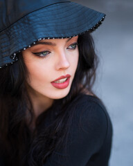 portrait of beautiful girl with clear eyes and hat