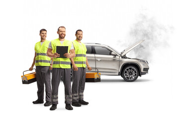 Team of road assistance workers with reflective vests standing in front of a SUV