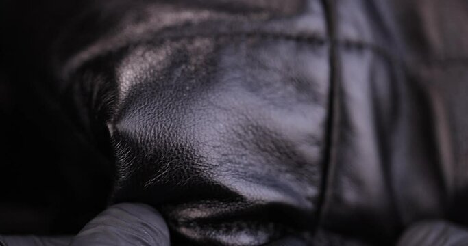 black - painted leather , details and part of the jacket made of artificial leather in black