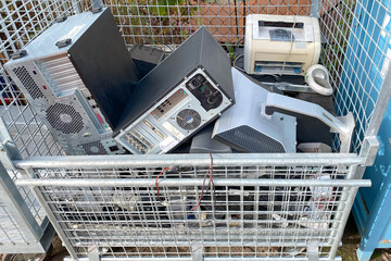 Heap of Uld used electro devices, PC computer, printer, monitor. recycled electronic waste in dump...
